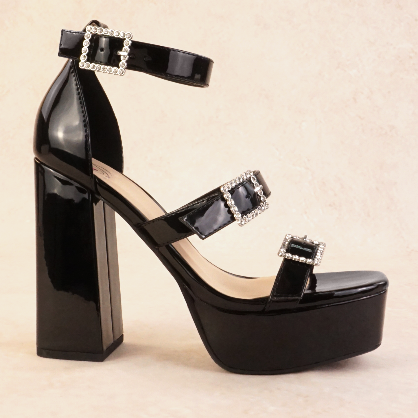 Black patent block heels with rhinestone buckles