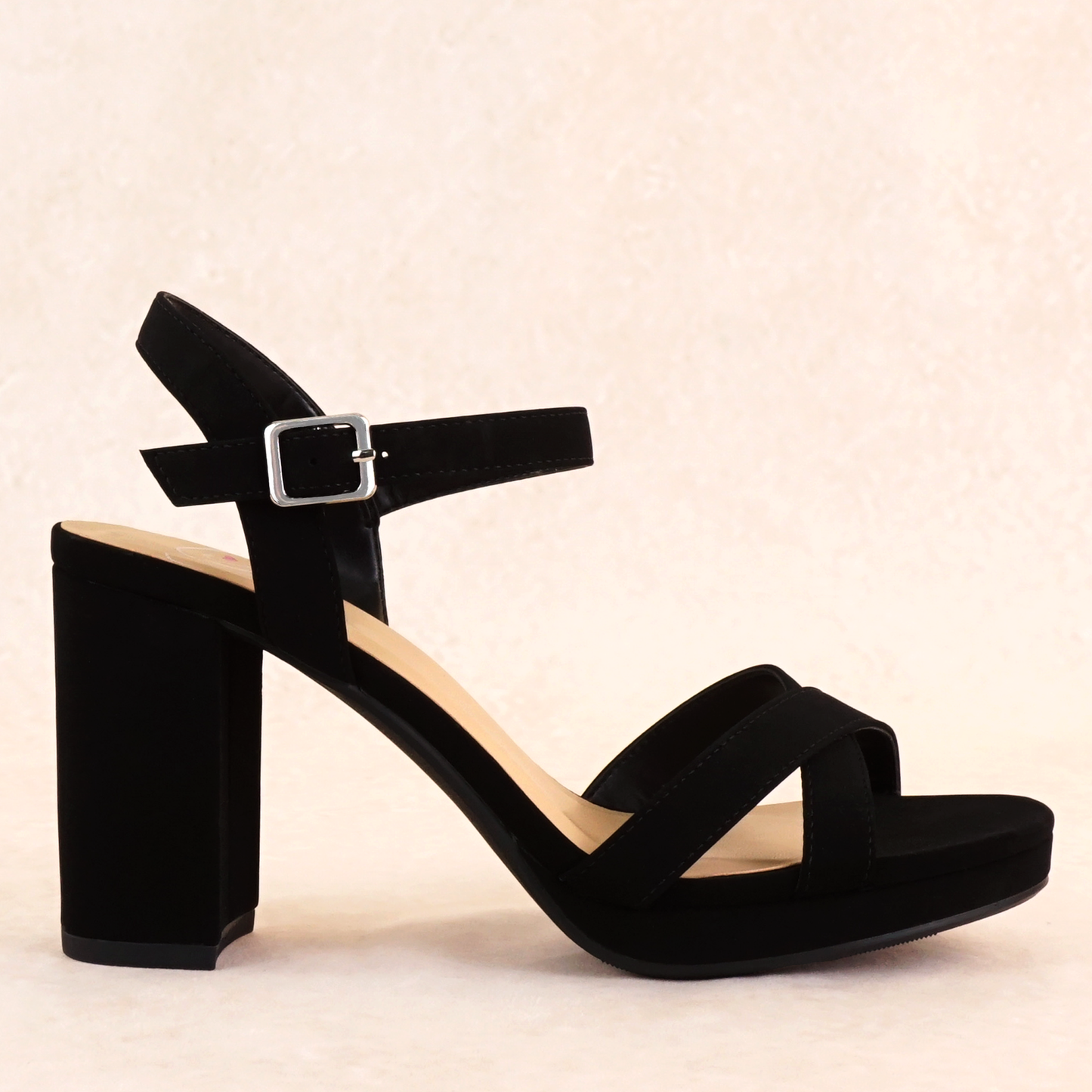 A black open-toe block heel with a small platform in a soft nubuck material, with an adjustable ankle strap and cross-strap across the toes