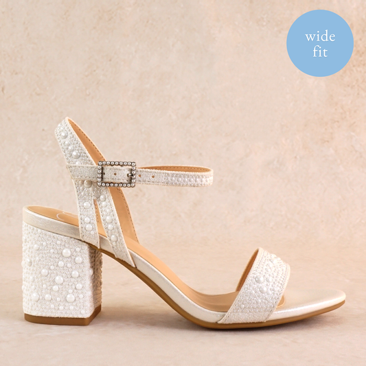 Wide fit 2.75" block heel in white with allover pearls and a slim ankle strap