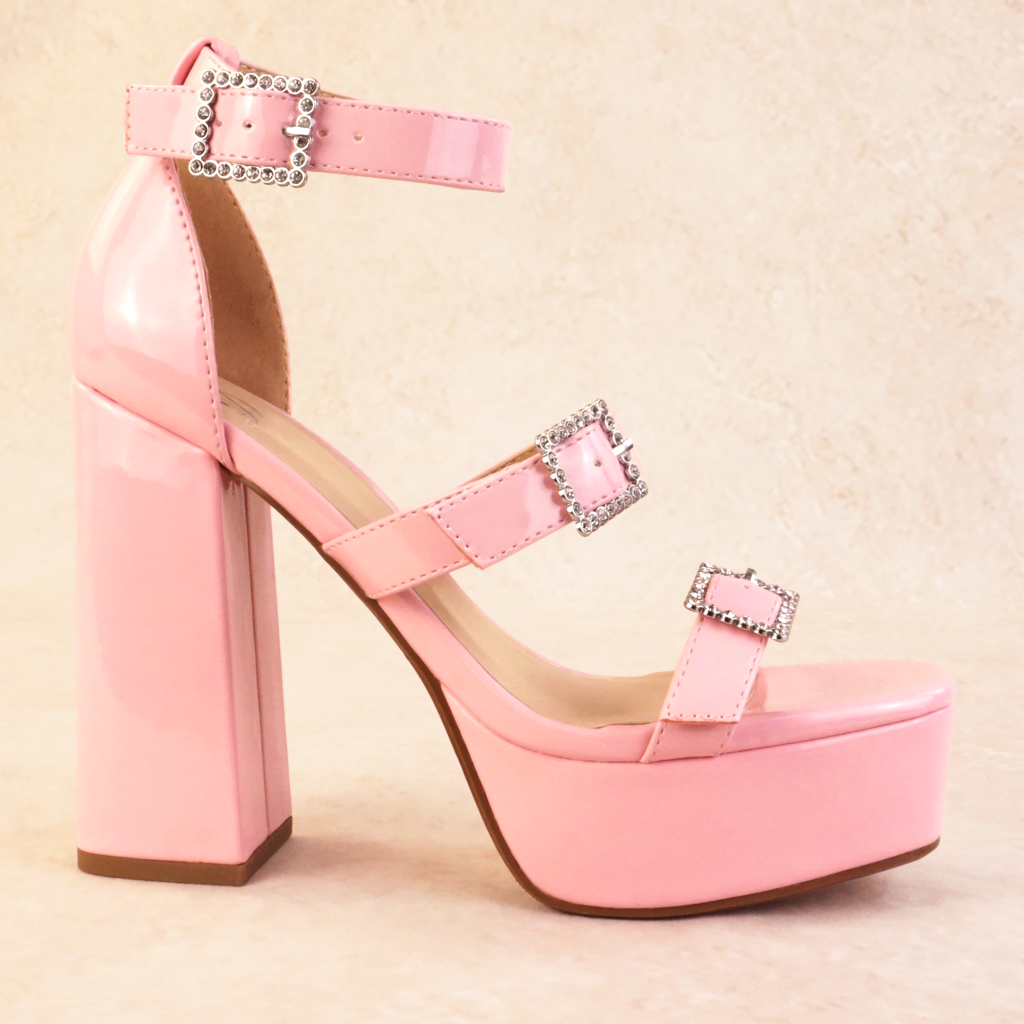 Pink patent block heels with rhinestone buckles