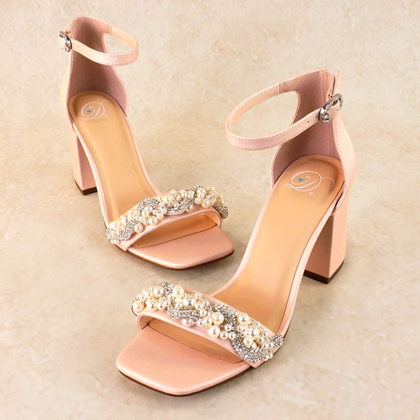 Pearls and rhinestones intertwined on a pink single-band 3.25" ankle strap block heel