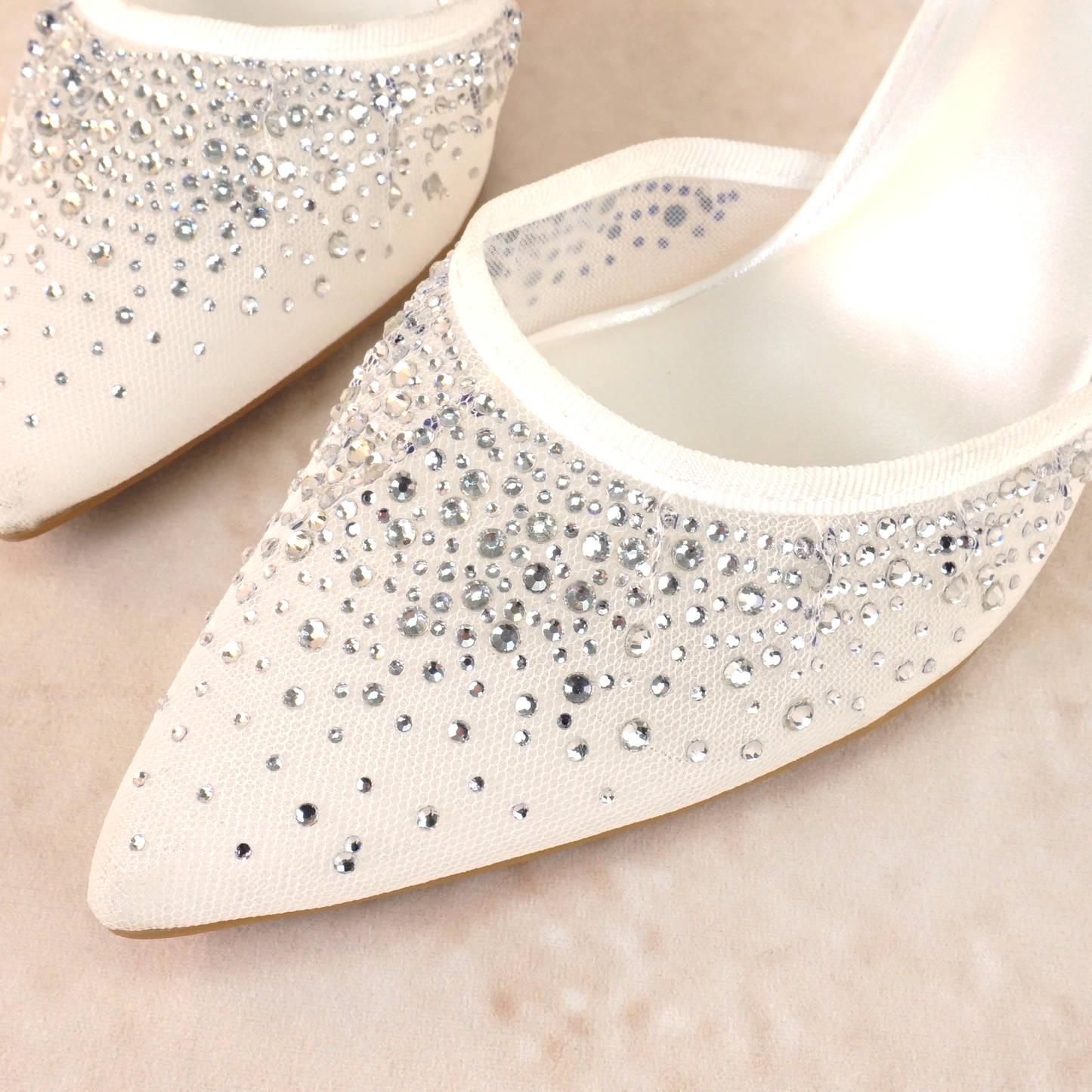 White d’orsay pump with adjustable slingback and a 3.5" heel