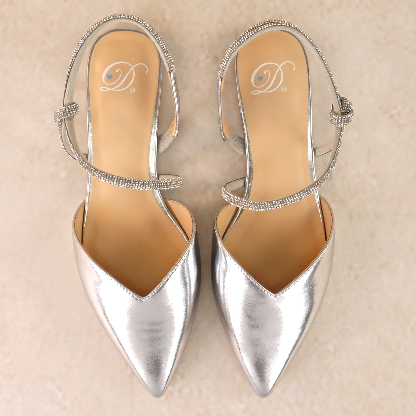 Pointed-toe slingback silver flat with rhinestone strap