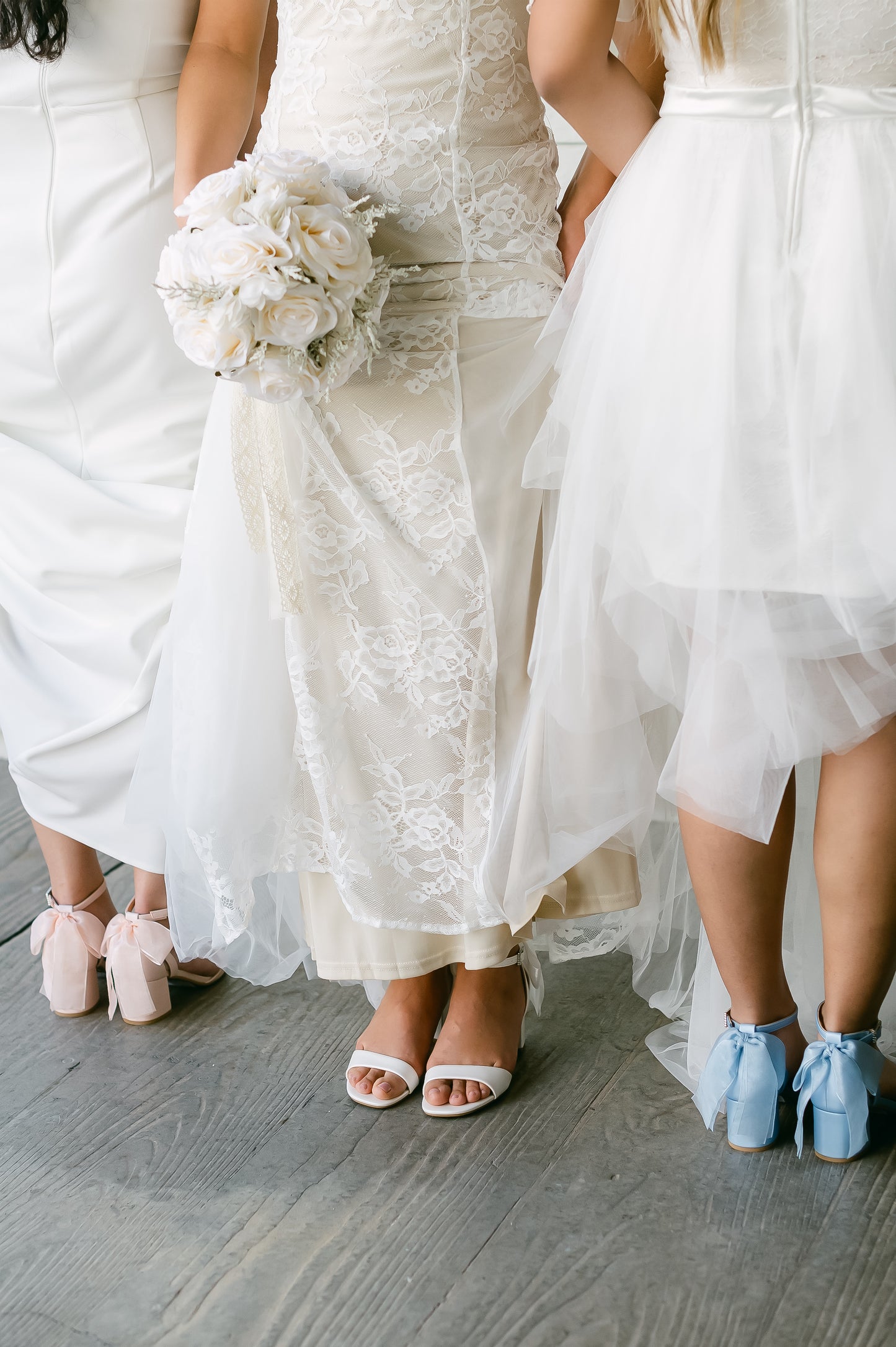 Simple low 2.5" block heels in pink, white and blue with a bow at the back