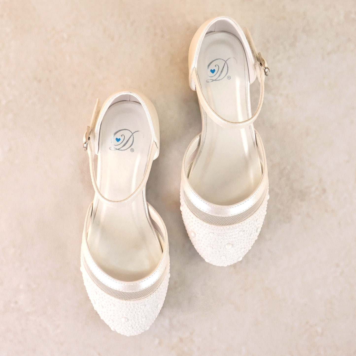 Cutout flat with allover pearl and mesh detail in a pearl shimmer