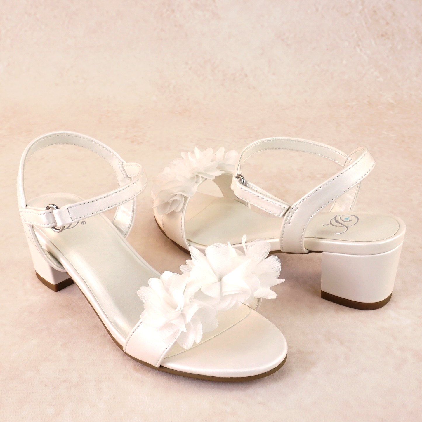 1.75" block heel single band white sandal with floral detail