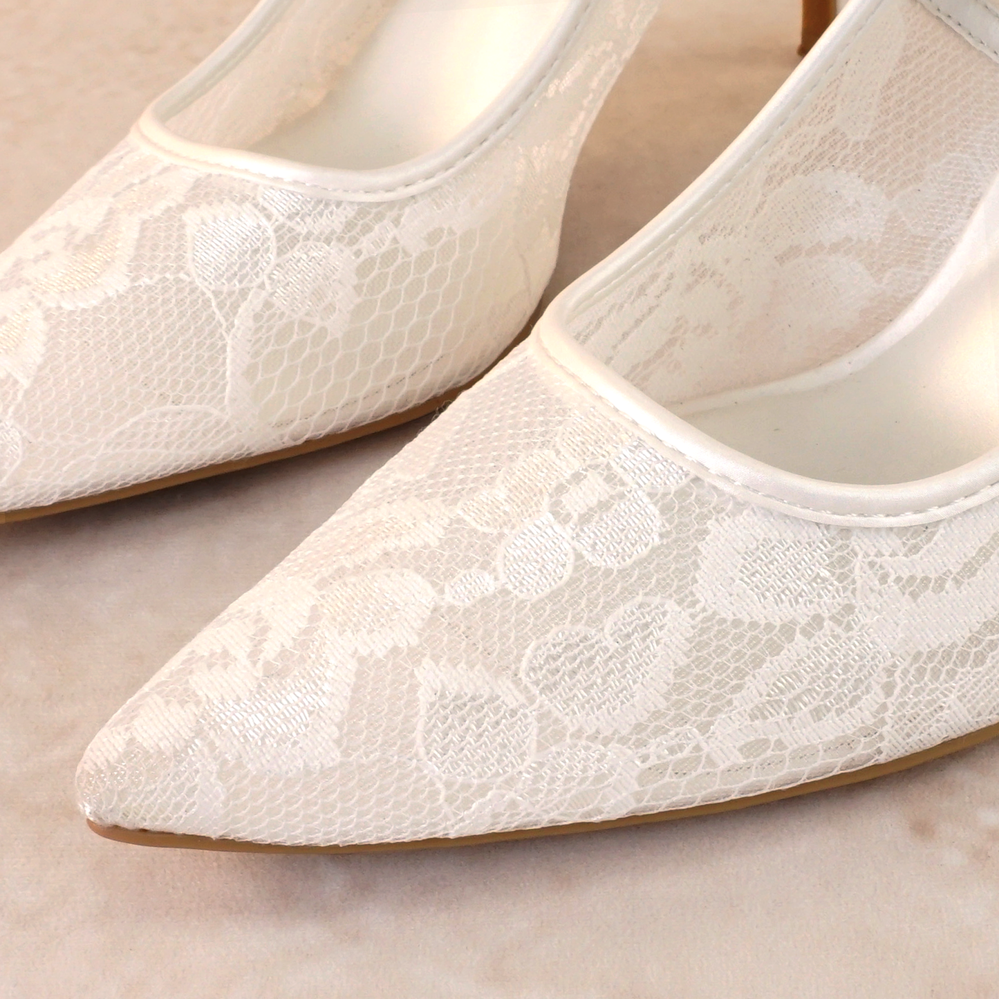 Classic white allover sheer lace stiletto pump with a 3.5" heel
