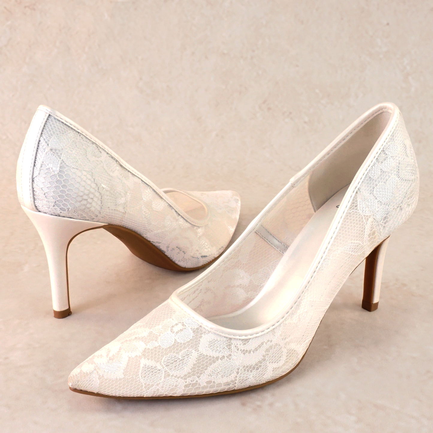 Classic white allover sheer lace stiletto pump with a 3.5" heel