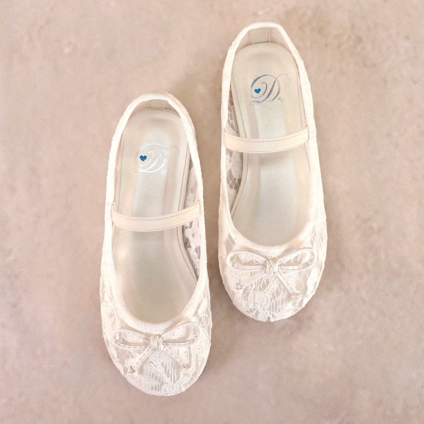 Allover lace flat with elasticized Mary Jane strap and bow detail