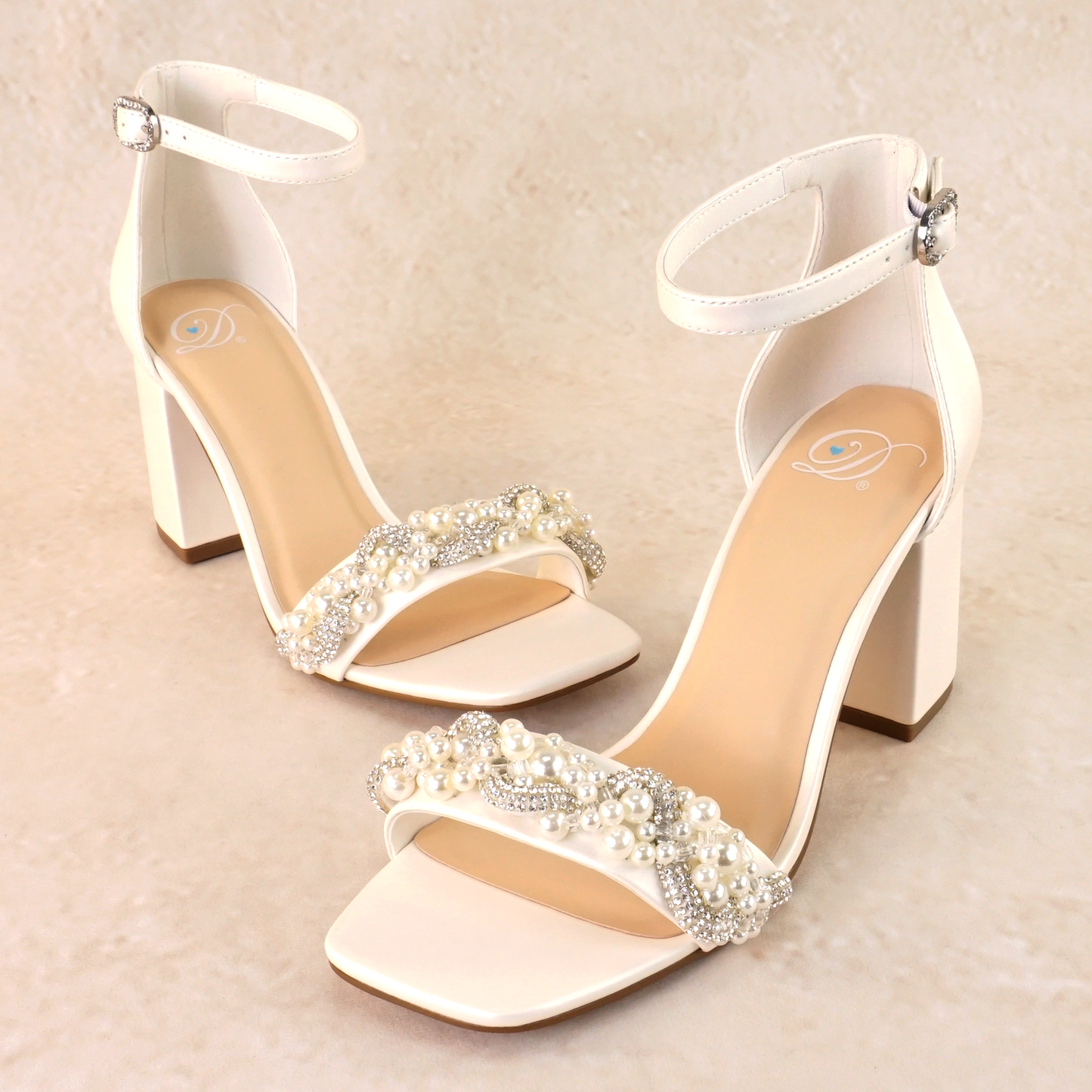 Pearls and rhinestones intertwined on a white single-band 3.25" ankle strap block heel