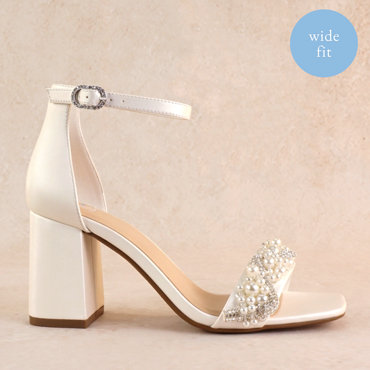 Pearls and rhinestones intertwined on a wide fit single-band 3.25" ankle strap block heel