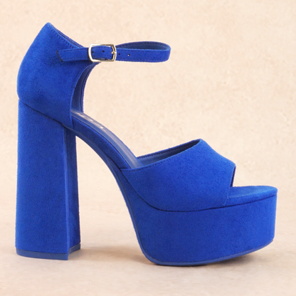A blue platform high heel with adjustable buckle ankle strap
