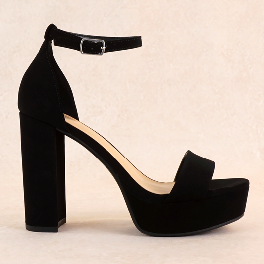 A black open-toe high block heel with a platform in a soft nubuck material, with an adjustable ankle strap and single strap across the toes