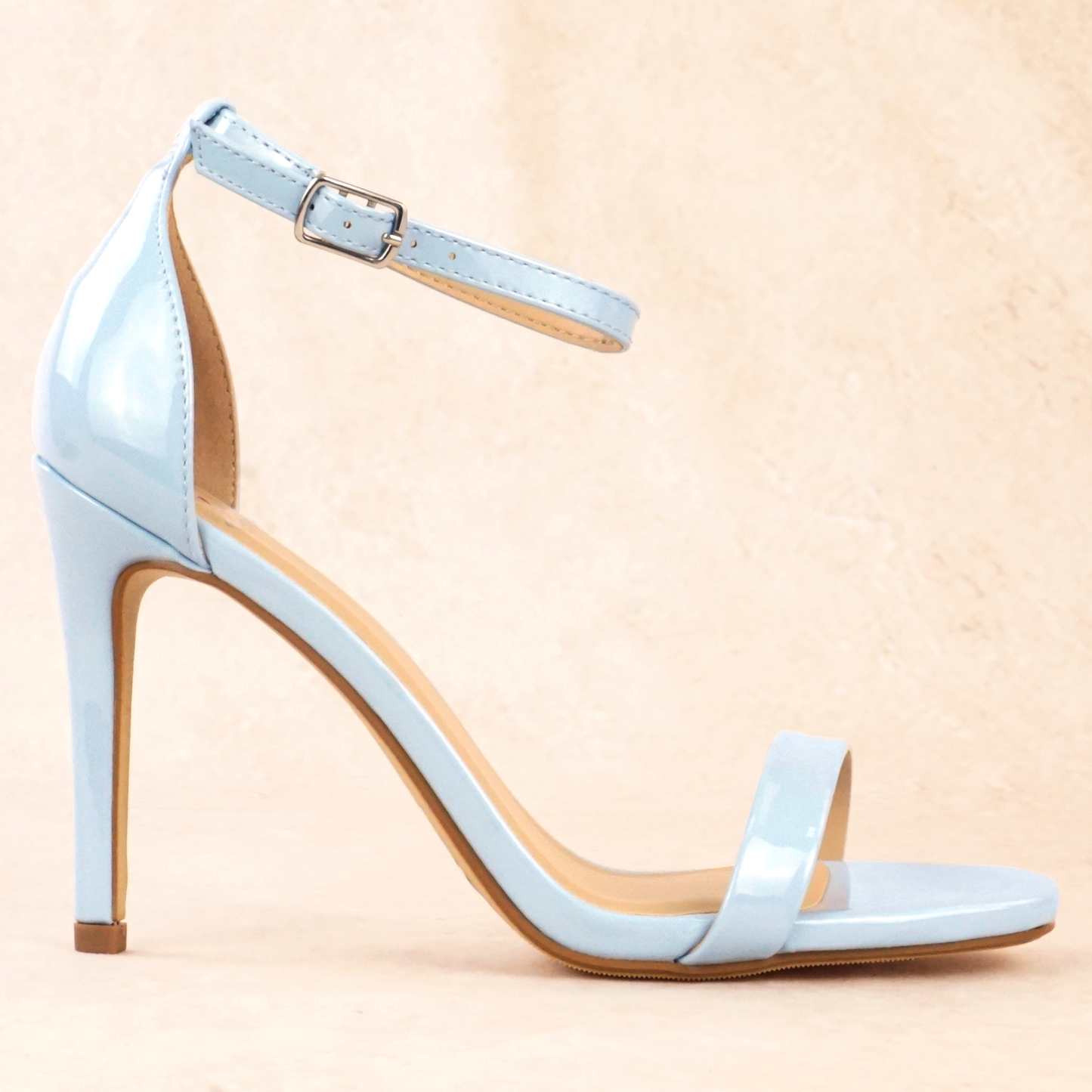 Blue patent material stiletto heels with adjustable ankle strap