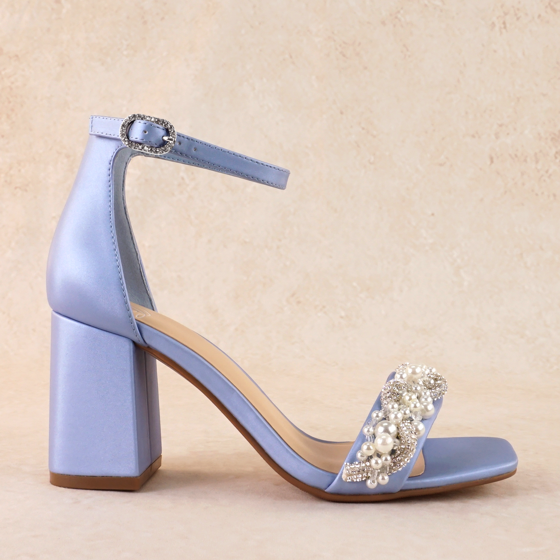 Pearls and rhinestones intertwined on a blue single-band 3.25" ankle strap block heel