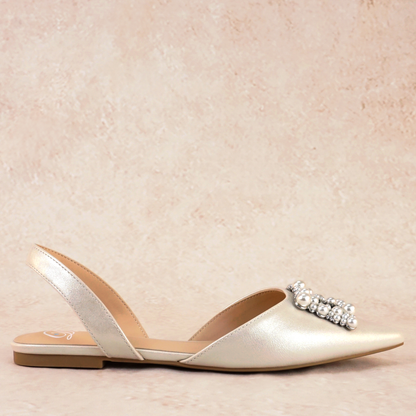 Slingback flat with a pearl buckle accent in a pearl shimmer