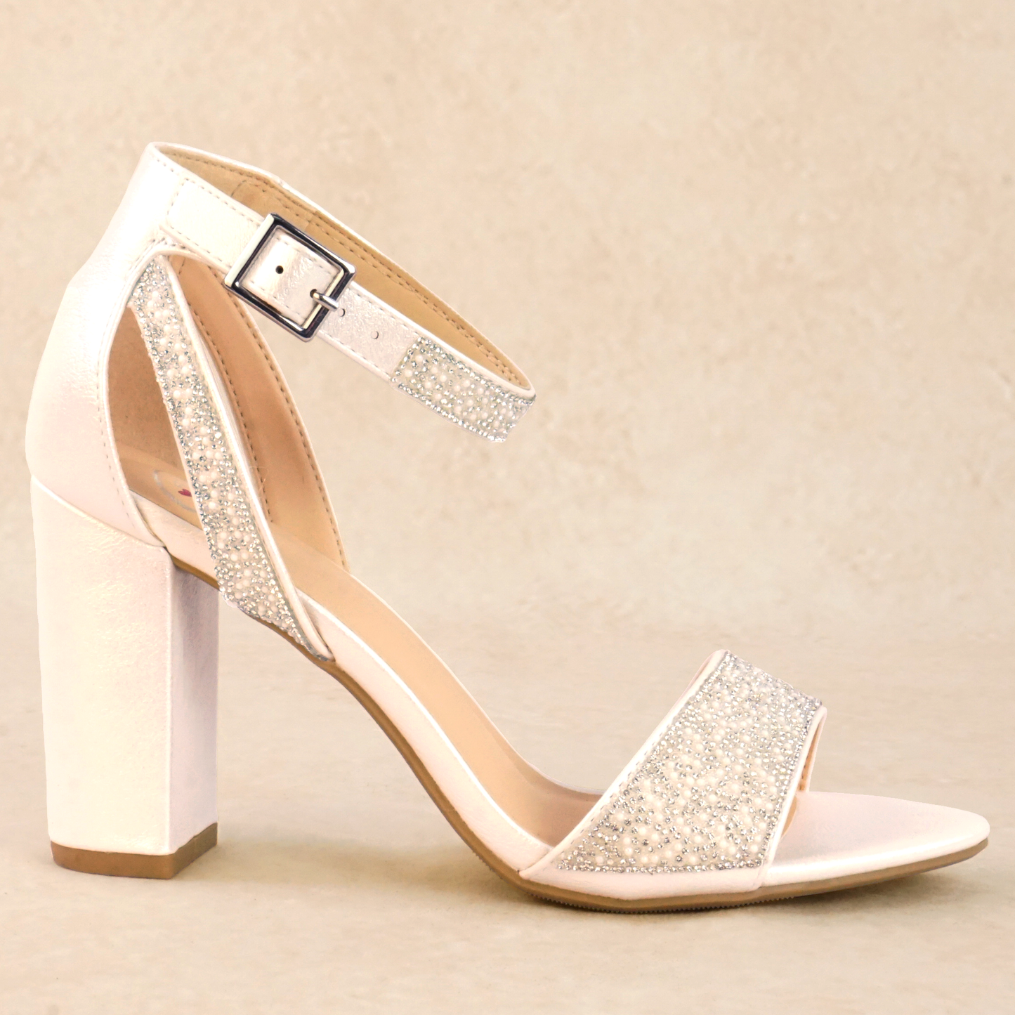 A while pearlescent block heel with pearls and rhinestones and adjustable ankle strap