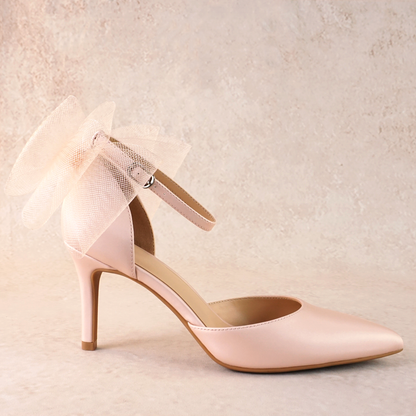 Pink d’orsay pump with ankle strap bow detail and a 3.25" stiletto heel