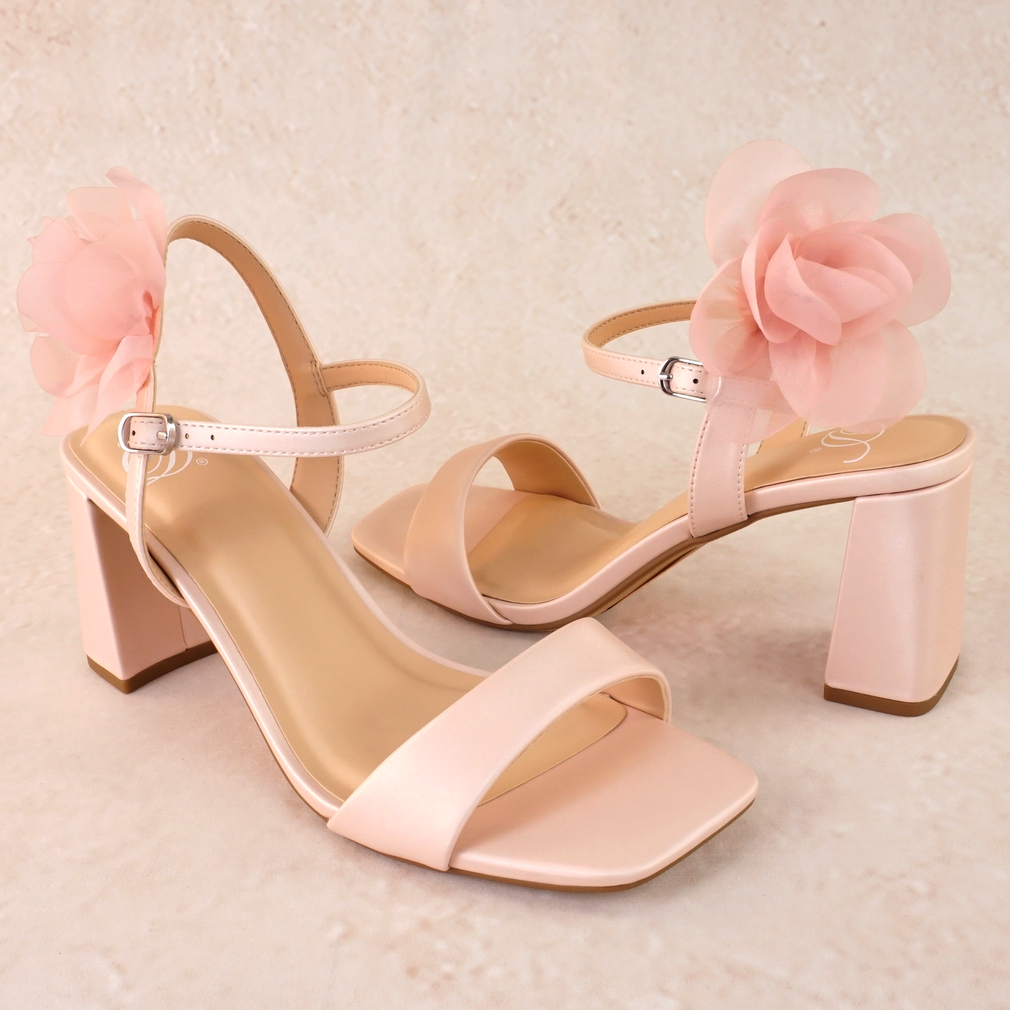 Flared 3" block heel in pink with slim ankle strap and flower detail 