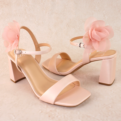 Flared 3" block heel in pink with slim ankle strap and flower detail 