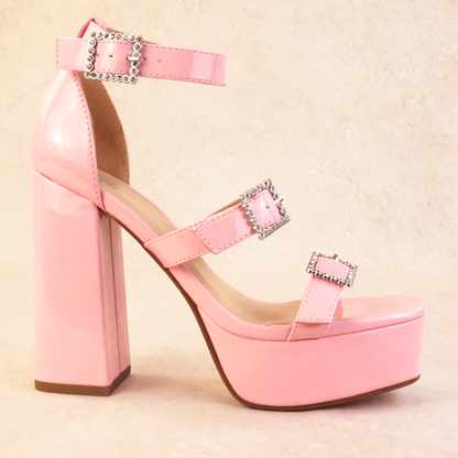 Pink patent block heels with rhinestone buckles