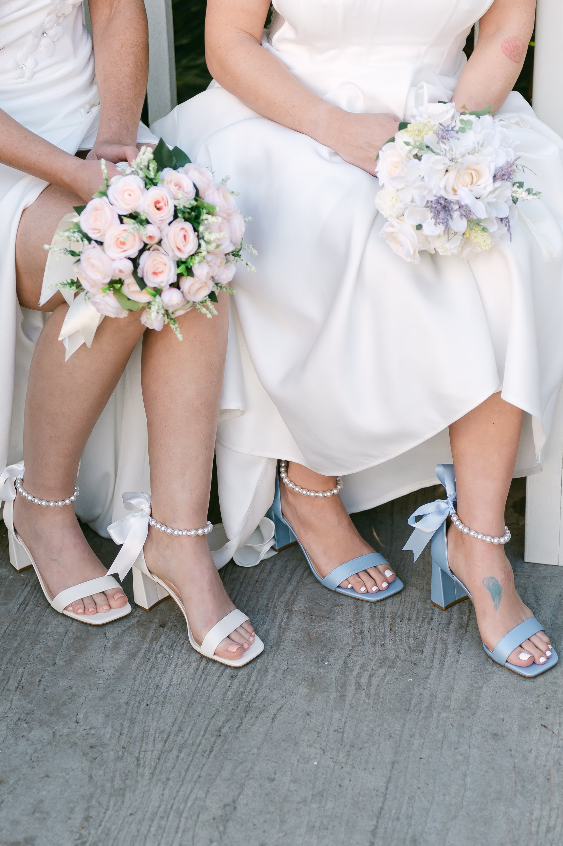 3" flared block heels in blue and white with adjustable pearl ankle strap and satin ribbon tie worn by two women in white dresses