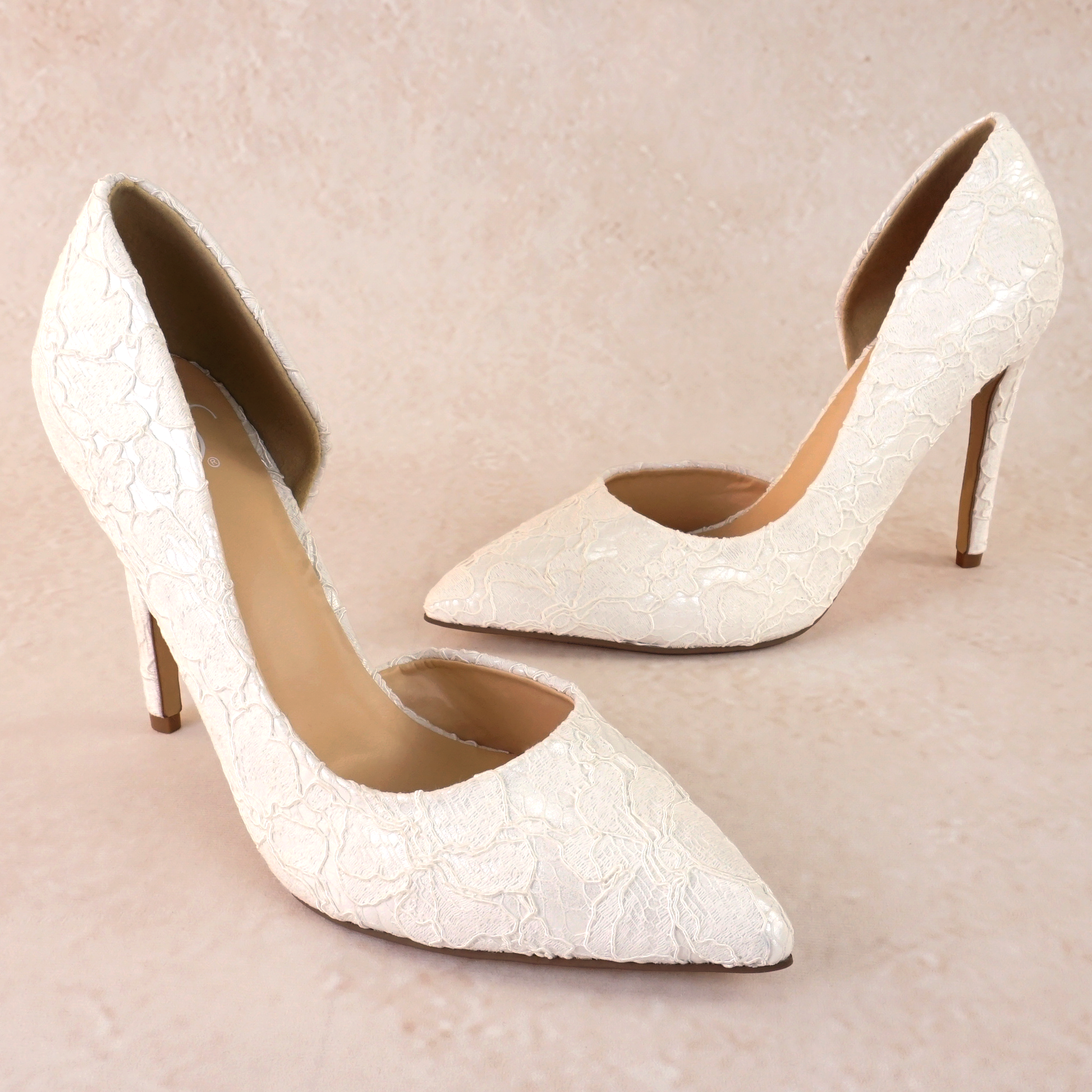 White lace d’orsay cut-out stiletto with a 4.25" heel