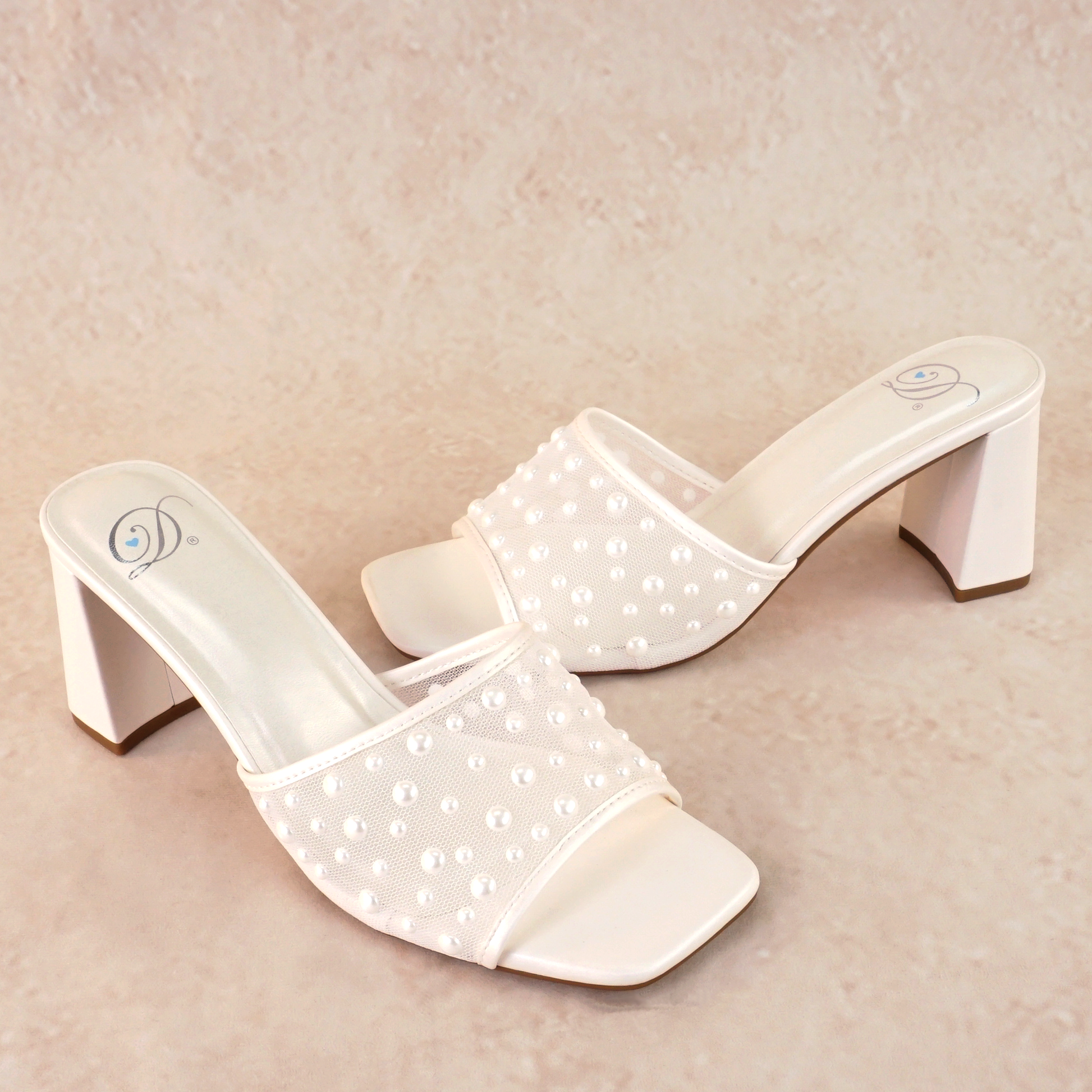 Mesh heeled white slide sandal with a 3" heel and pearls studded all over
