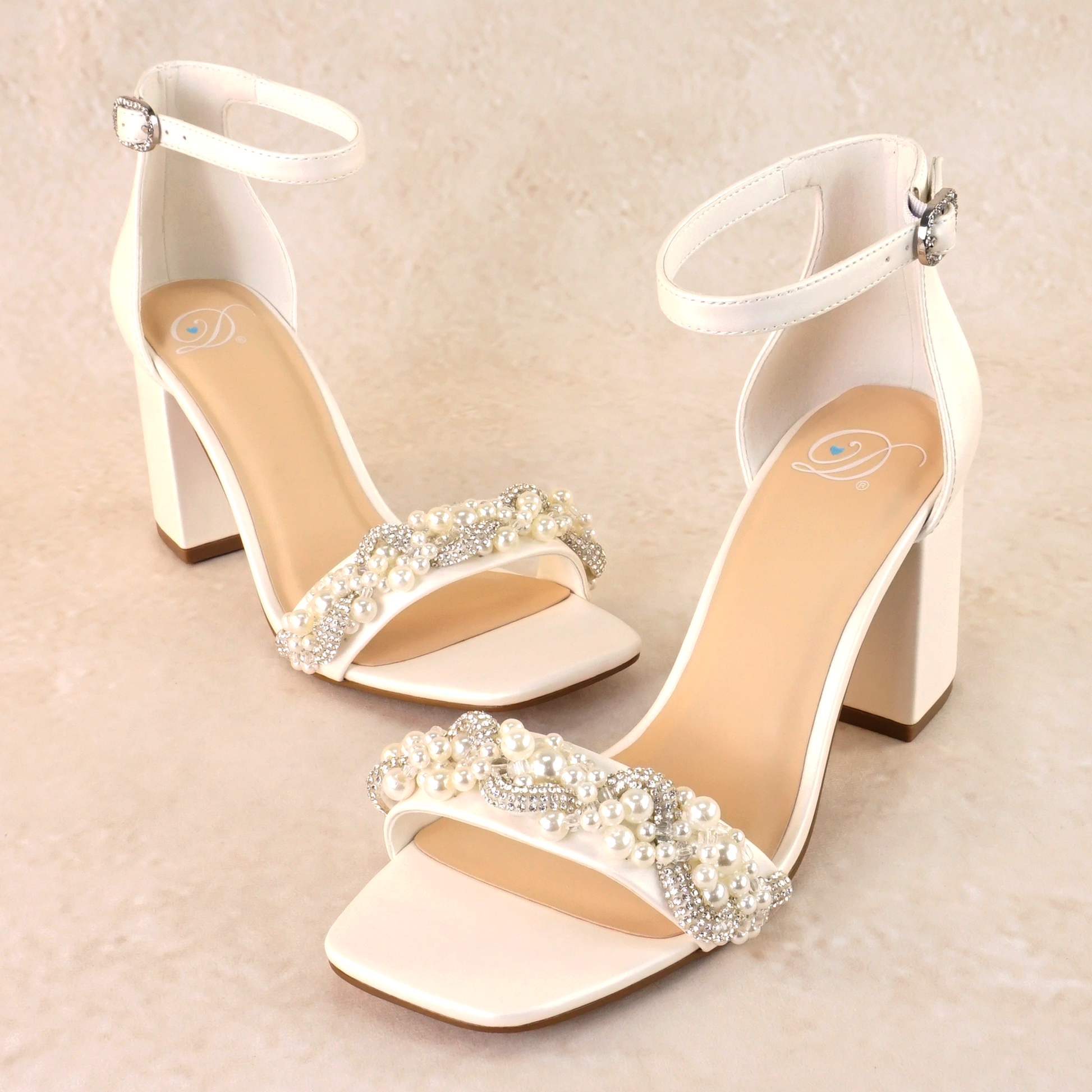 Pearls and rhinestones intertwined on a white single-band 3.25" ankle strap block heel
