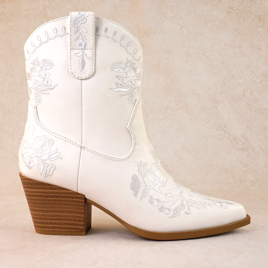 Western white bootie with embroidered flowers and a 2.75" stacked heel